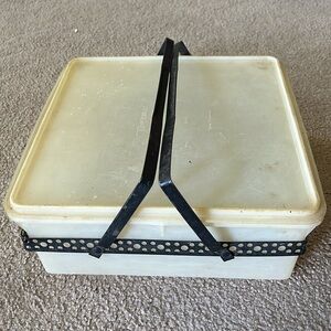 Vintage Tupperware Square seal with metal carrier.